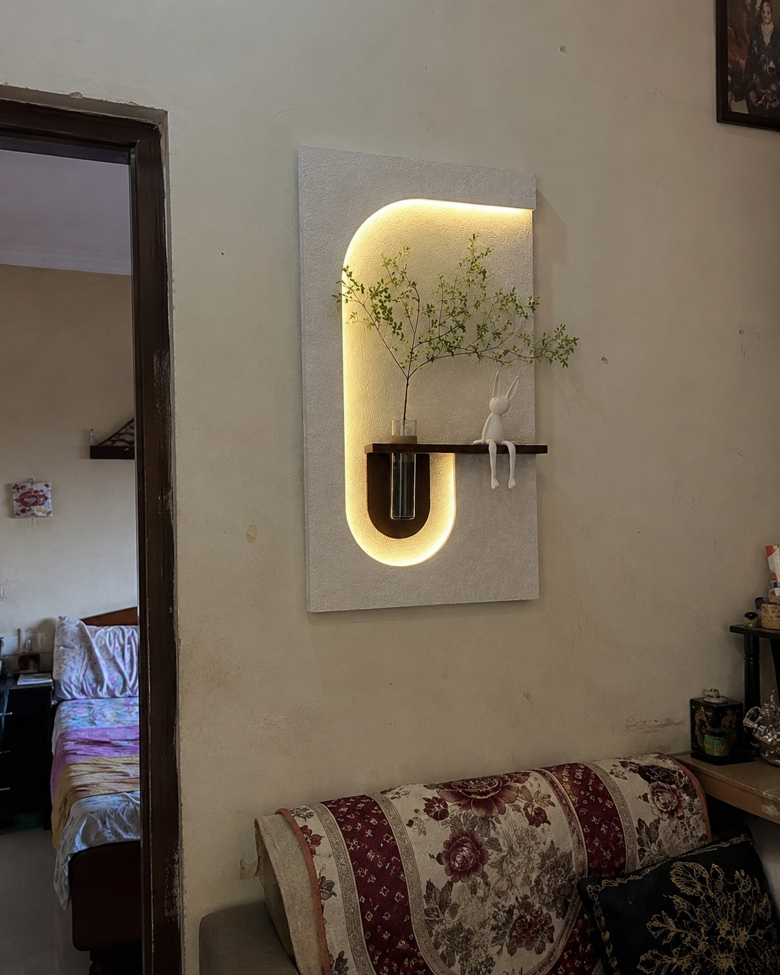 Modern LED Wall Décor Shelf with Plant Vase & Artistic Design Panel”