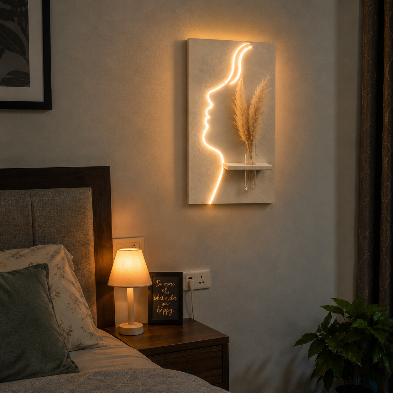 That's a beautiful piece — a glowing face silhouette LED wall art with a mini shelf and pampas grass. Very on-trend for home decor! 🌿✨